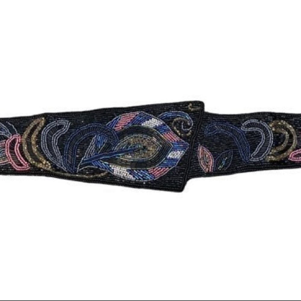 Vintage belt by Collectif best fit a xs or a smaller small does not fit a medium
